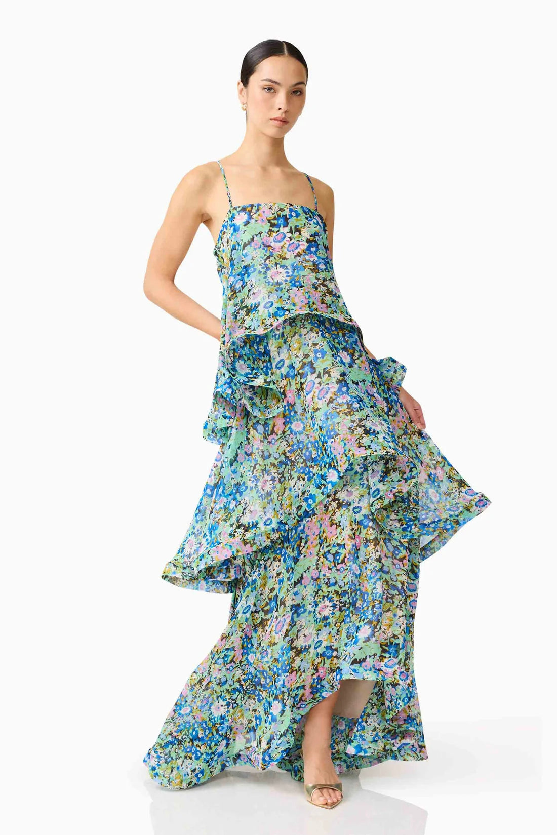 Woman wearing the Armani Tiered Maxi Dress in Blue Floral by ELLIATT
