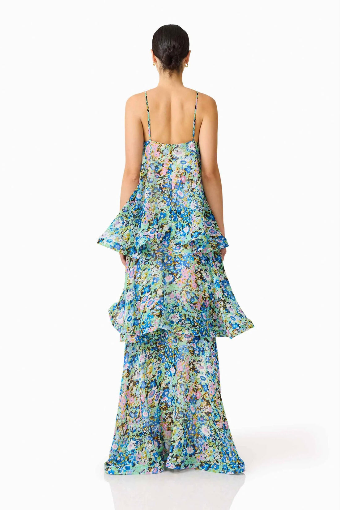 Back view of woman wearing the Armani Tiered Maxi Dress in Blue Floral by ELLIATT