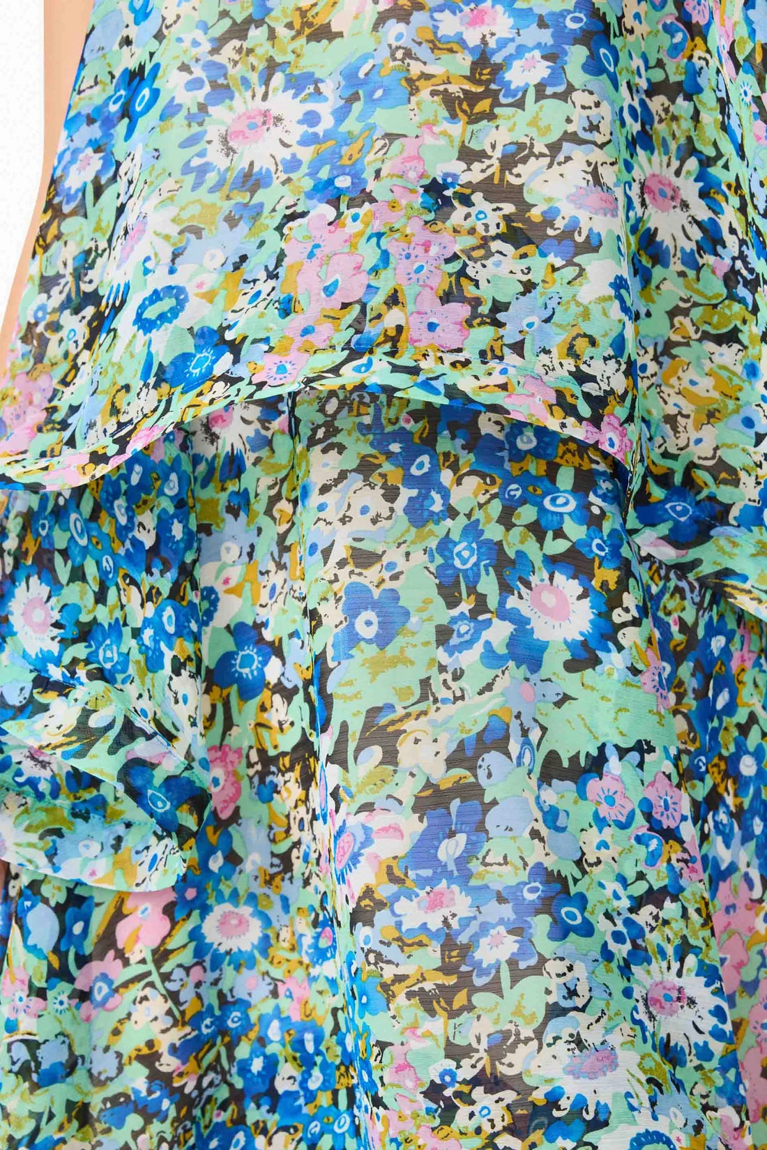 Close-up woman wearing the Armani Tiered Maxi Dress in Blue Floral by ELLIATT