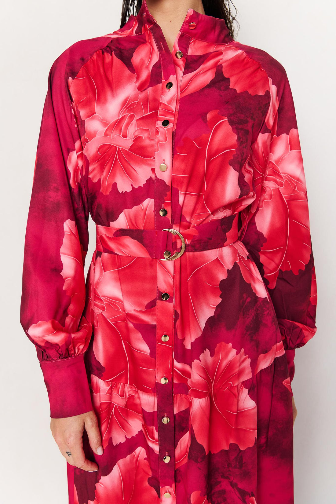 Detail of the minnie + MAXXIE Camille red floral midi dress with gold buckle belt