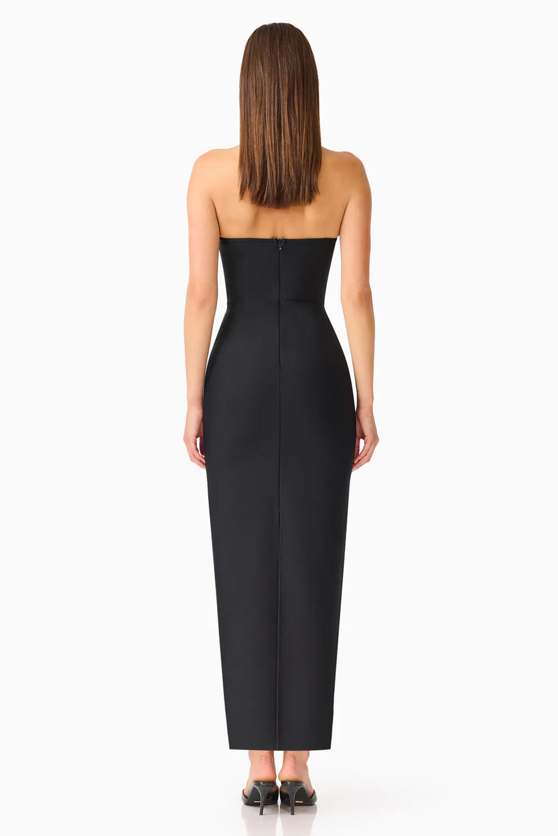 Back view of a woman modelling the ELLIATT Natasia embellished strapless black maxi dress, photographed against a plain white studio background.