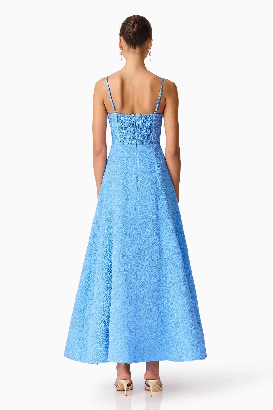 Back view of woman wearing the ELLIATT Briallen Jacquard Gown in blue