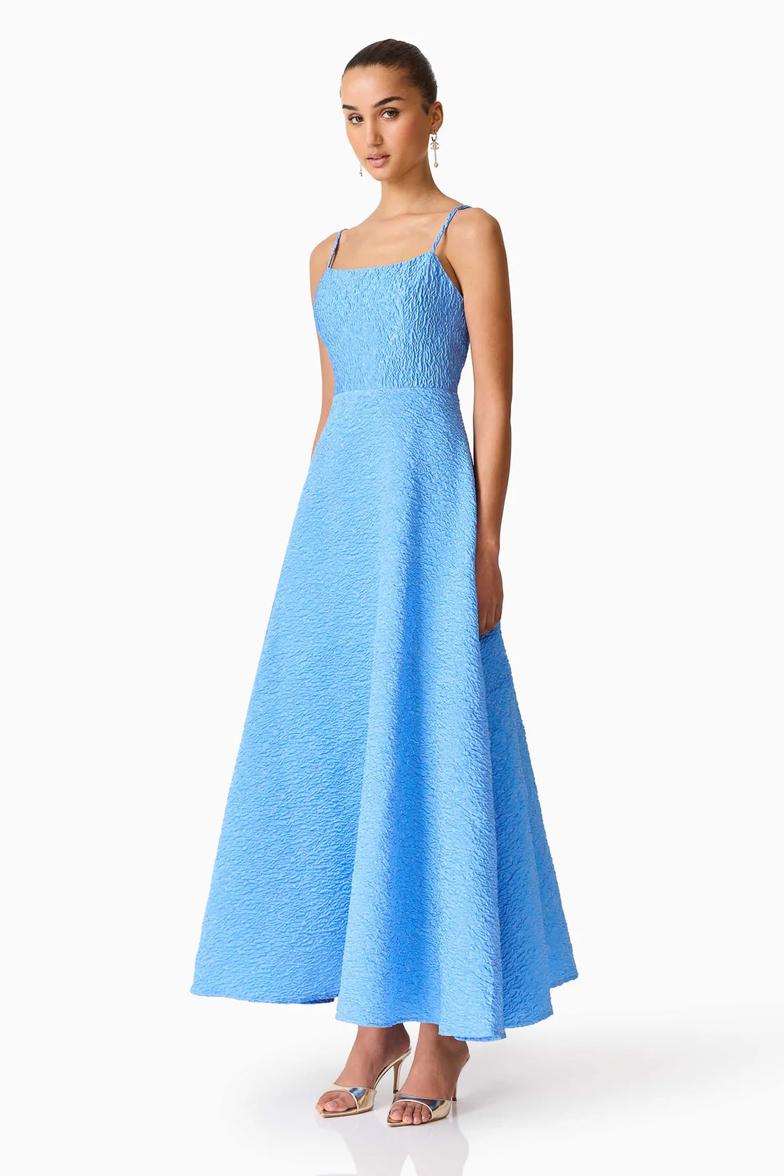 Side view of woman wearing the ELLIATT Briallen Jacquard Gown in blue