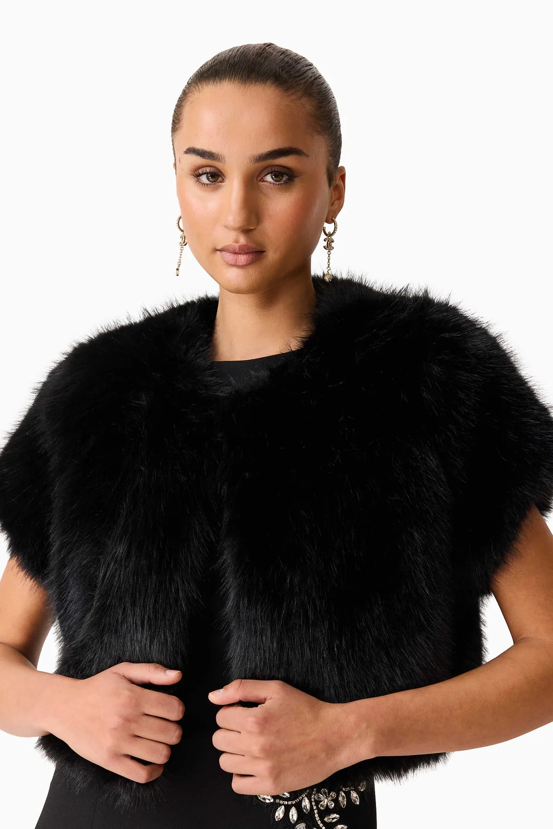 ELLIATT Lucyna short sleeve bolero in black faux fur close up of front