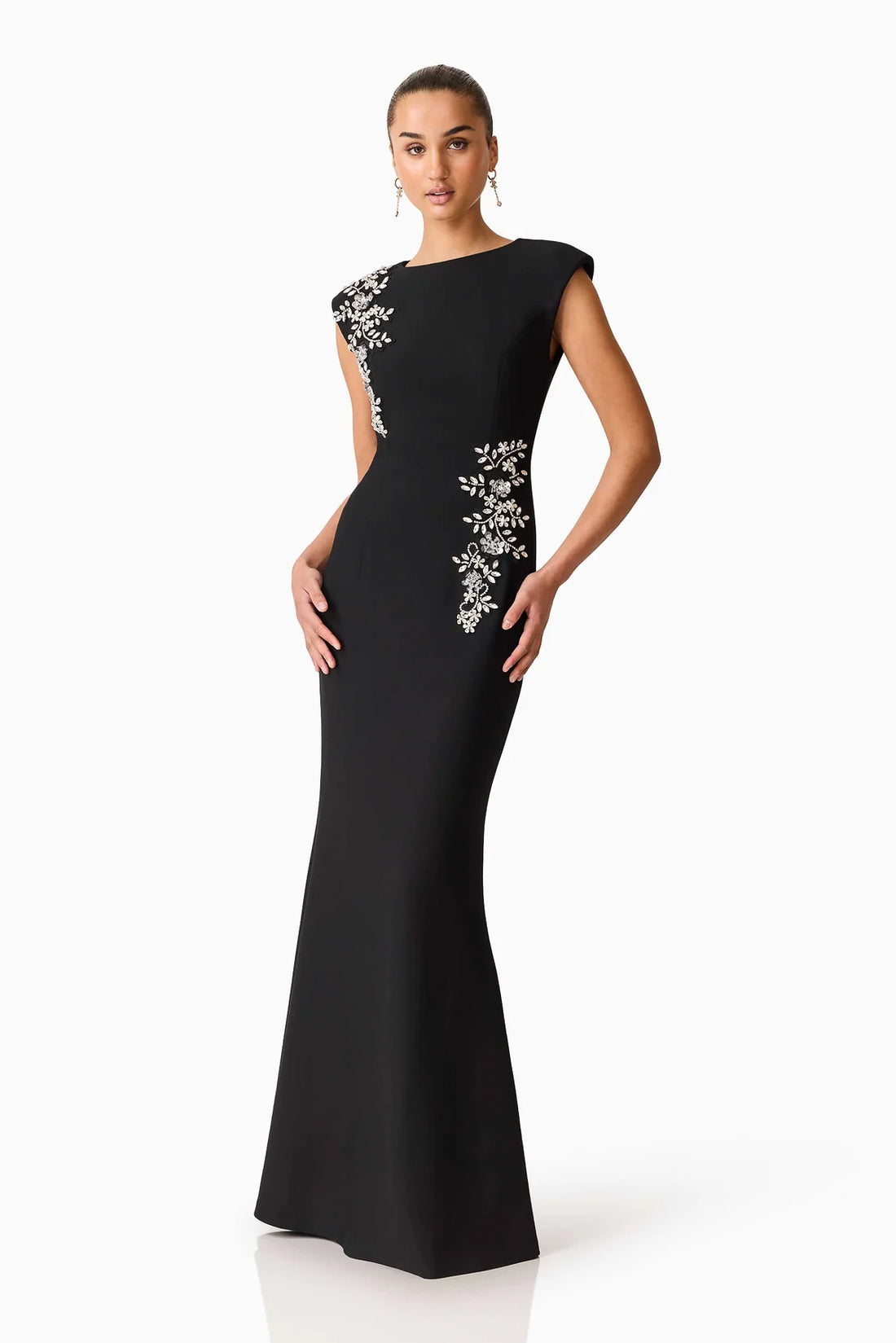 Front view of woman wearing the ELLIATT Veda Gown in black with diamante embellishments