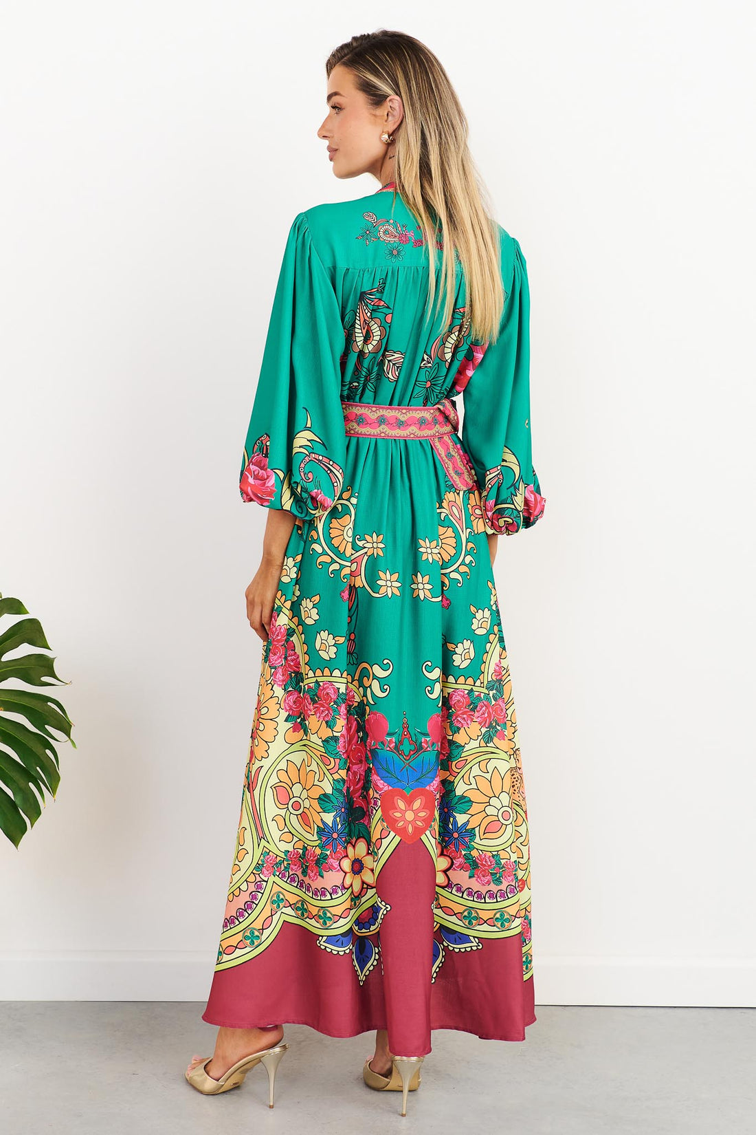 minnie + MAXXIE Franca Maxi Dress in emerald green with paisley print and balloon sleeves, back view