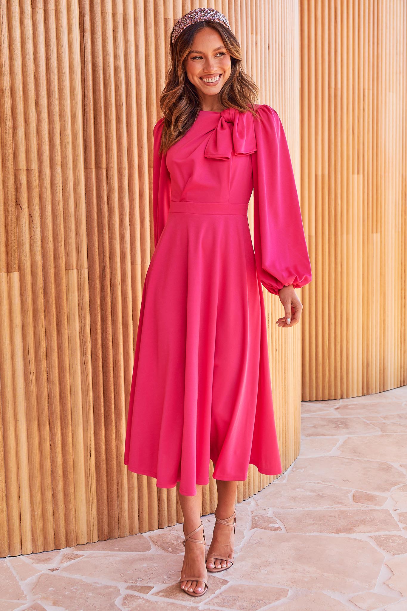 Pink dress with shop bow on shoulder