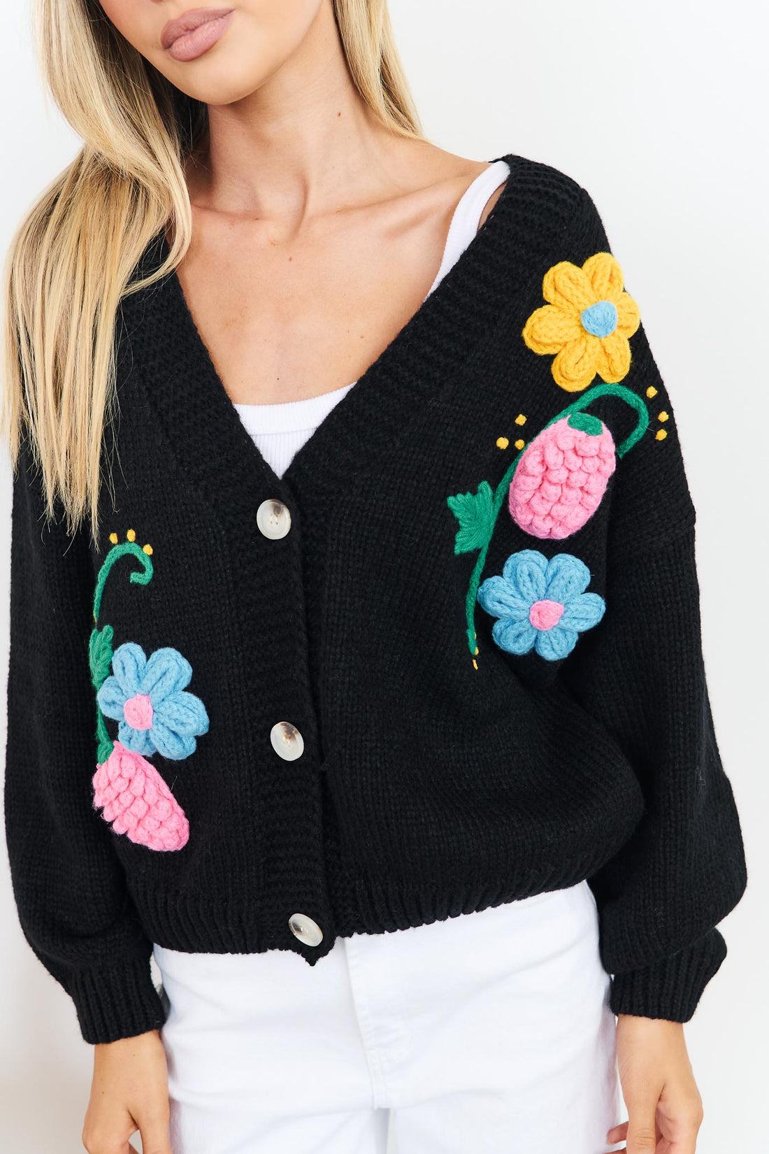 Detail of Lilah black Knit Cardigan with applique flowers