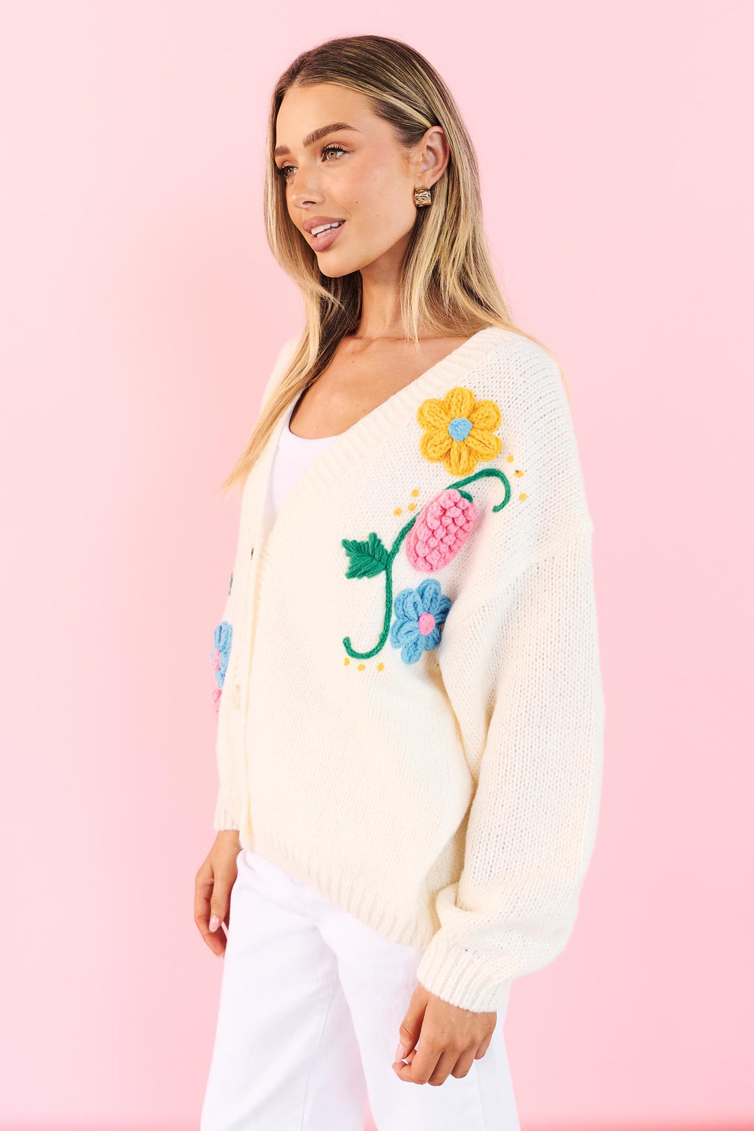 Side view of Lilah White Knit Cardigan with applique flowers
