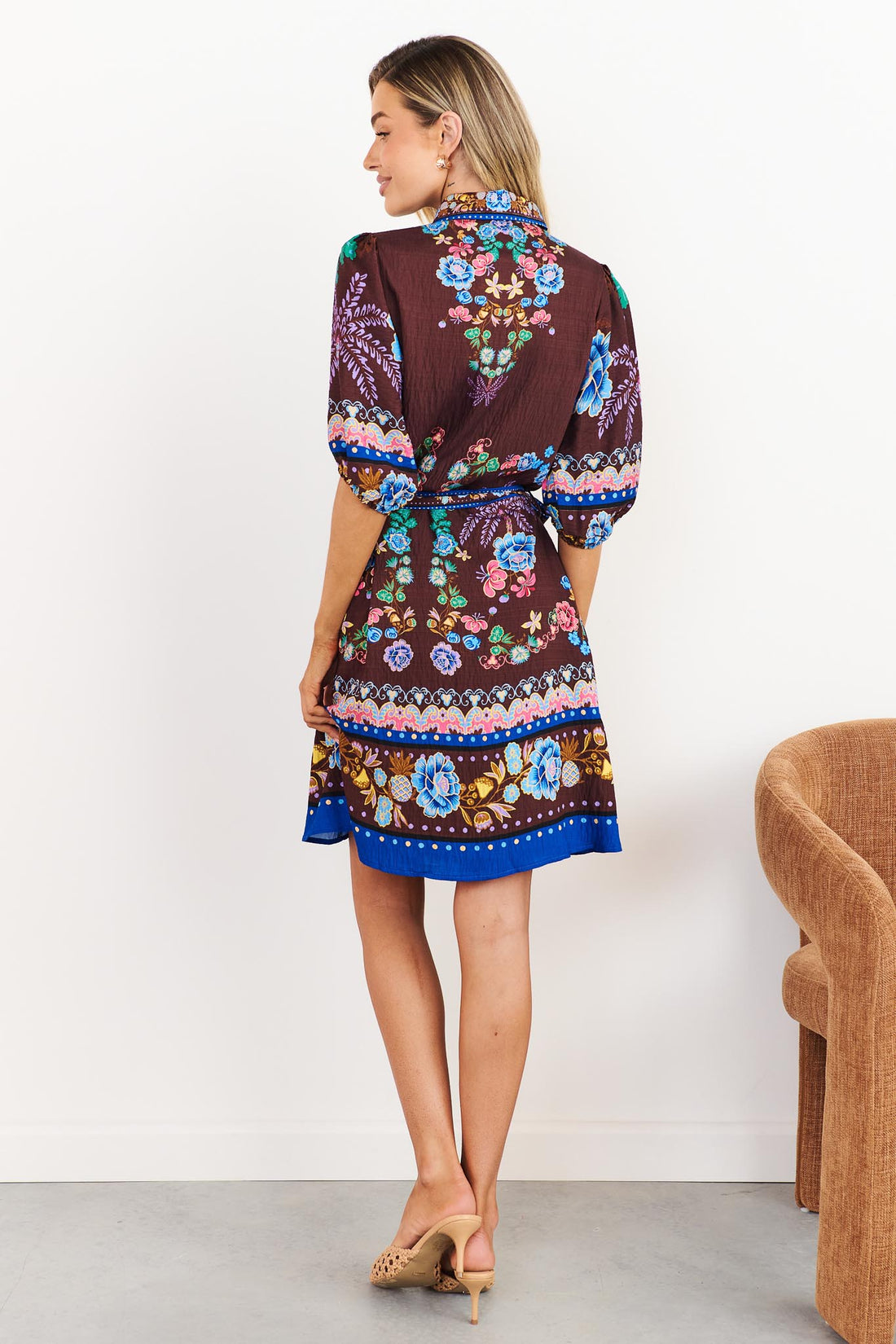 Back view of Margot dress in dark brown with floral print
