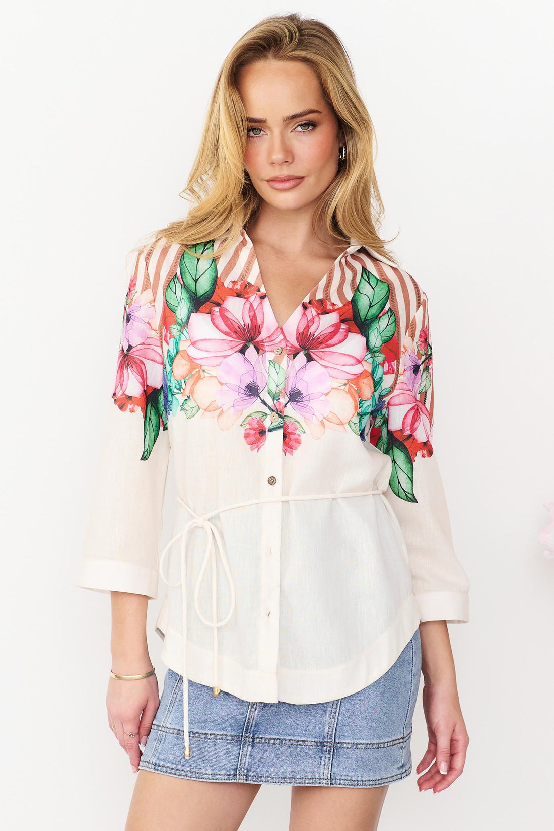 Mia Shirt in cinnamon with colourful floral patterns and stripes and a waist tie