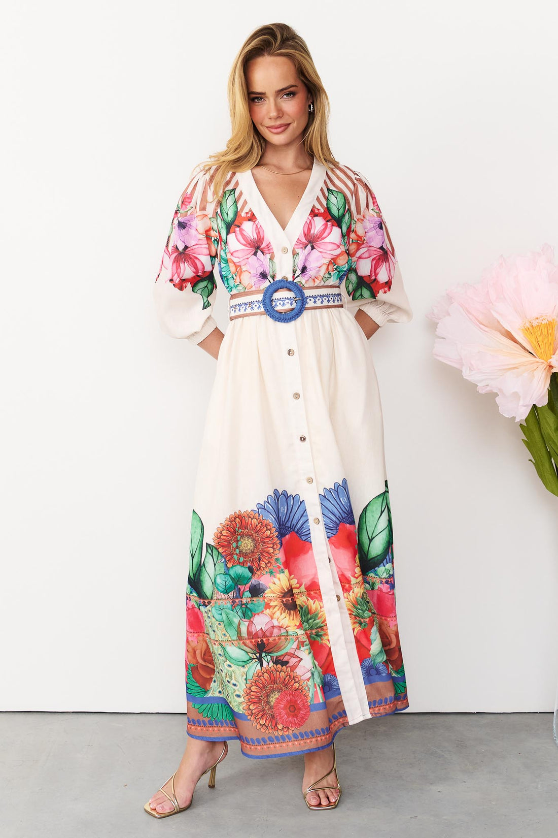 Rosabella maxi shirt dress with a bright floral and stripe print and a blue buckle belt