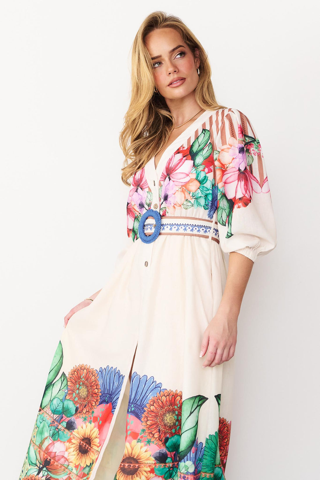 Close up of Rosabella maxi shirt dress with a bright floral and stripe print