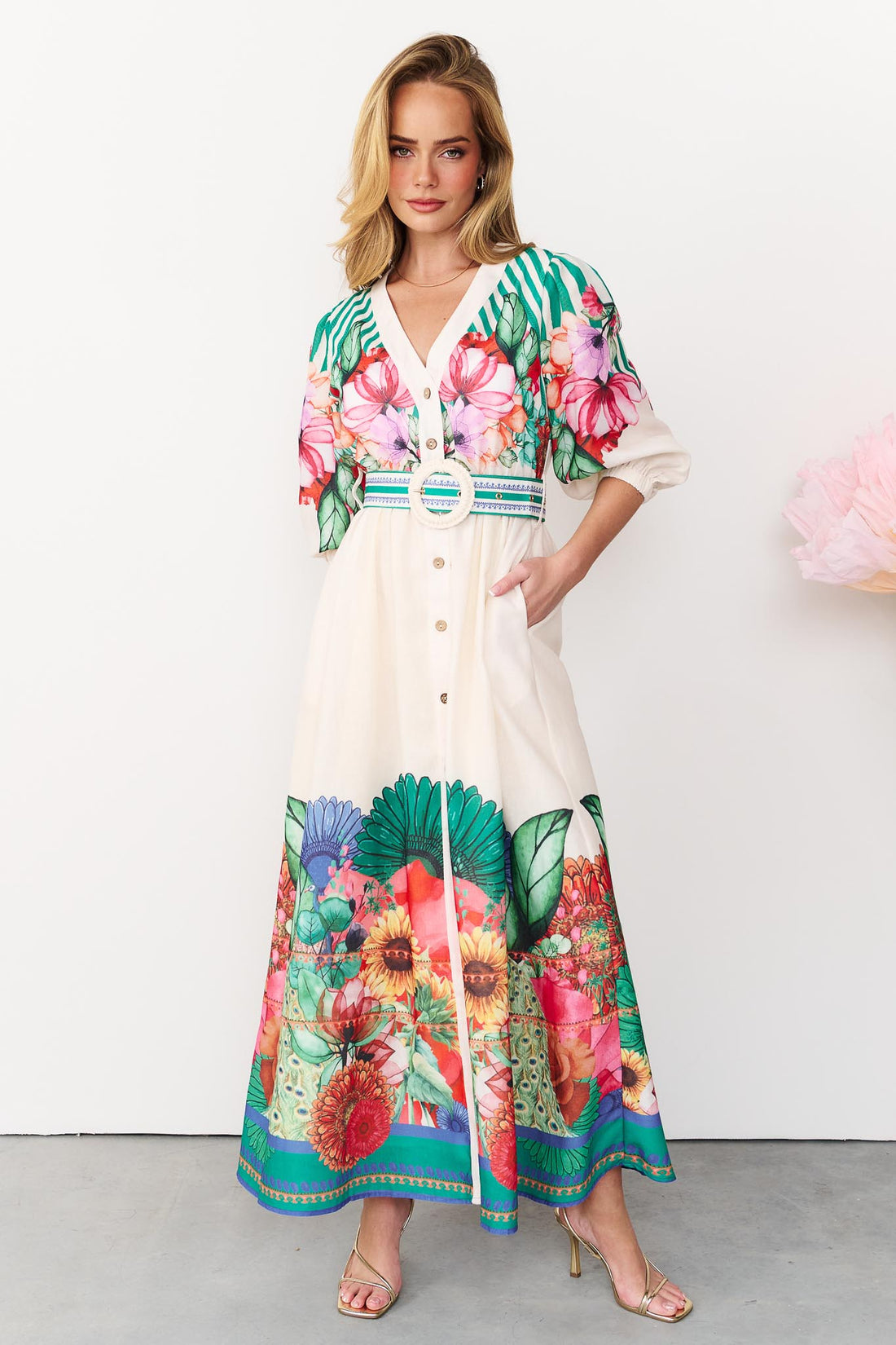 Rosabella maxi shirt dress with a bright floral and stripe print and white crochet buckle belt