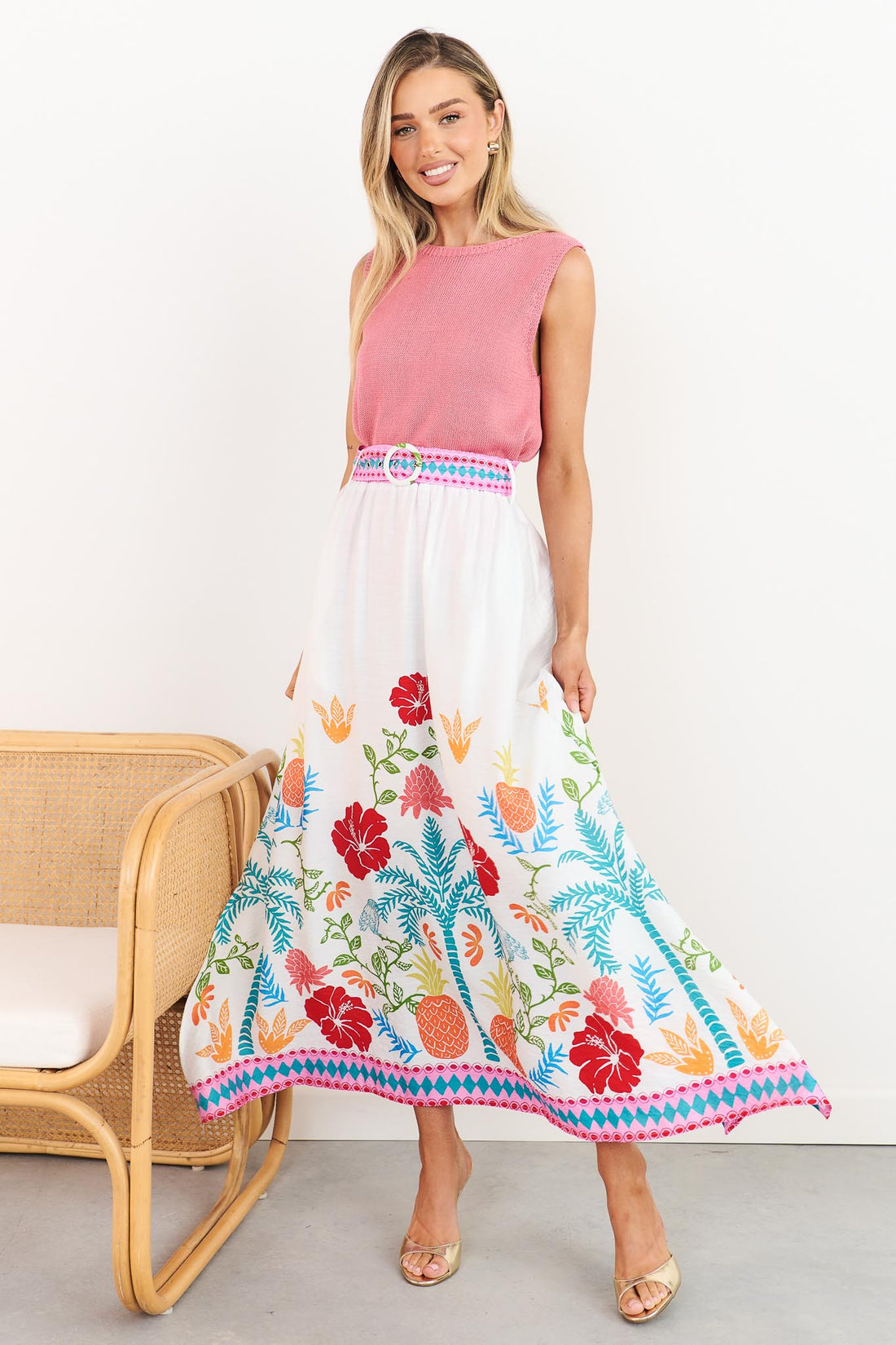 Valencia floral maxi skirt with pineapple print and matching belt, styled with pink Villa knit tank