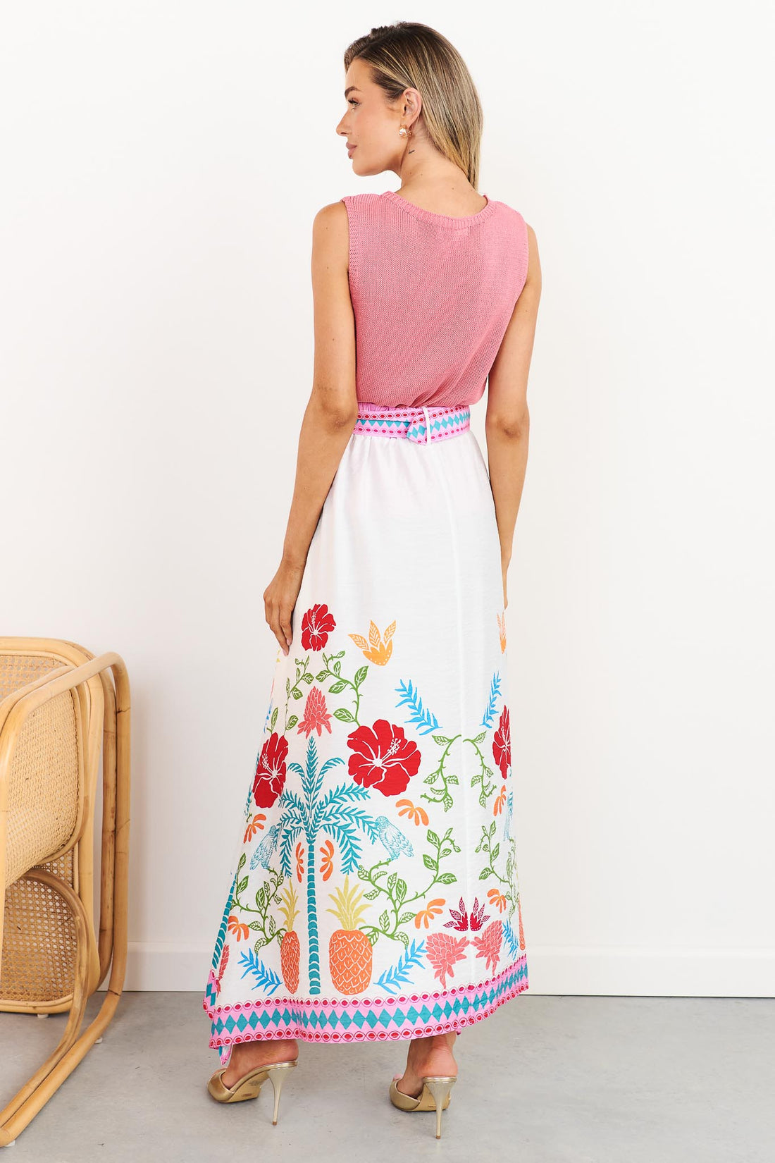 Valencia floral maxi skirt with pineapple print styled with pink Villa knit tank, back view