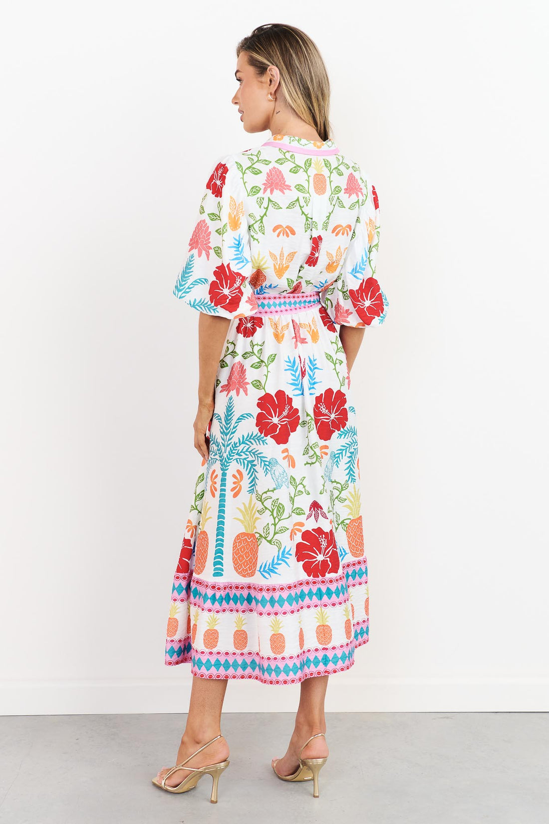 Valencia floral midi dress with pineapple print, short sleeves and matching belt, back view